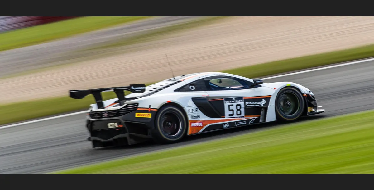 Custom McLaren GT racecar livery emphasising strategic sponsor placement.